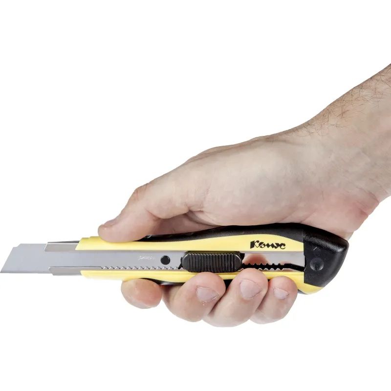 Нож канцелярский 18 мм КОМУС , с фиксатором, мет.направл.цв. в ассорт.